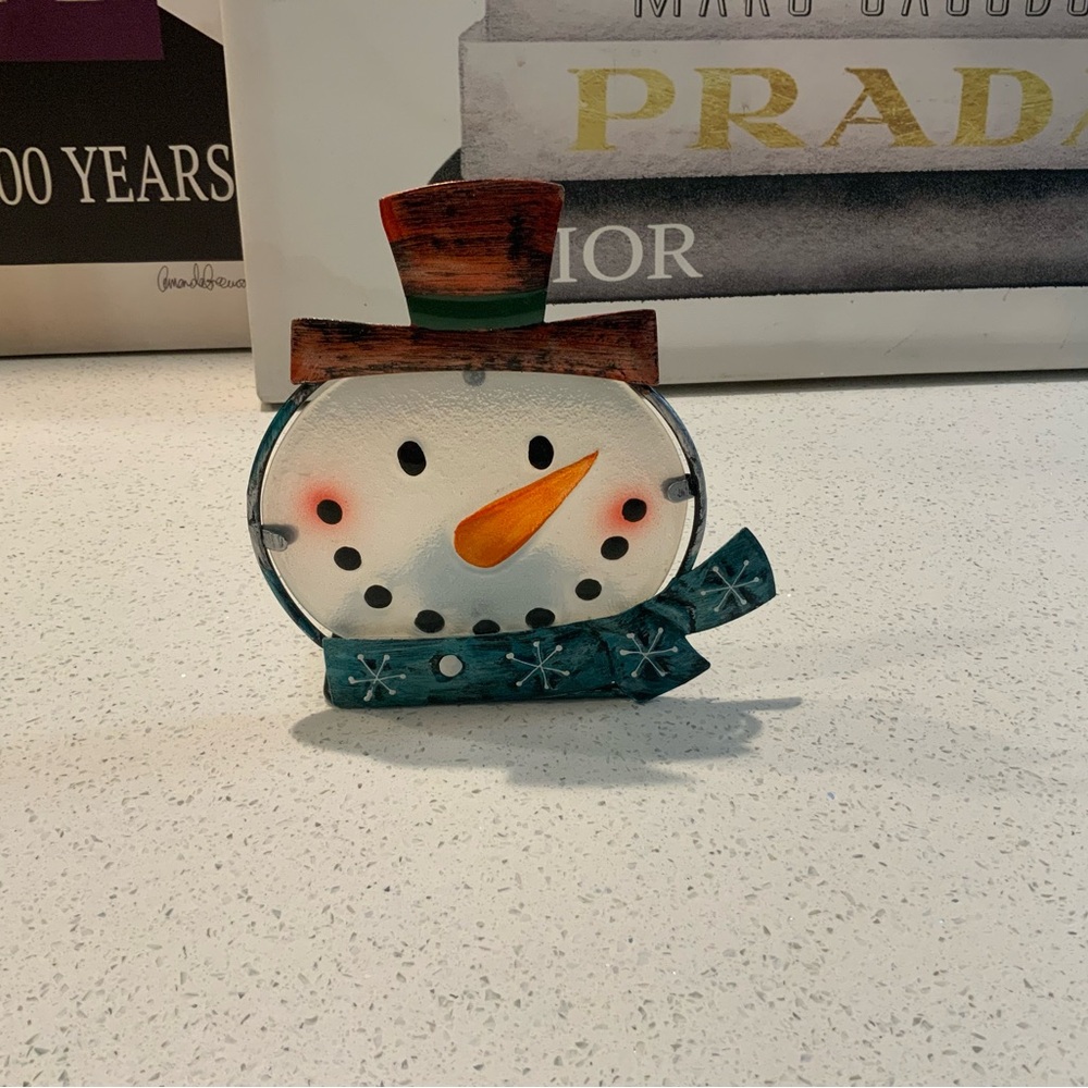 Snowman head candle holder